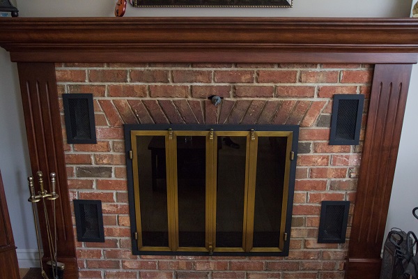 Grenier & Grenier, maçonnerie à Québec, maçonnerie, Québec, réalisations, résidentiel, salon, cheminé, mur, brique projet